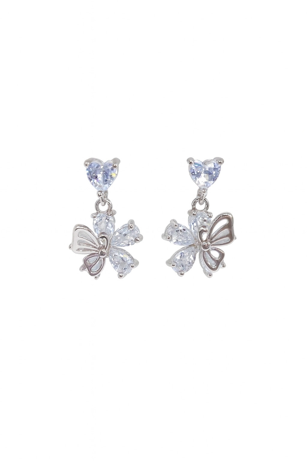 Butterfly-shaped earrings with gemstones on a white background
