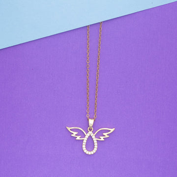 Gold necklace with a winged pendant on a purple and blue background