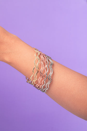 Set of 9 Wavy Metallic Bangles – Gold, Silver & Rose Gold