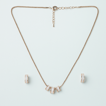 Necklace with geometric pendants on a light blue background