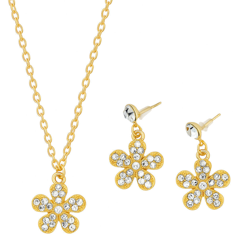 Gold flower necklace and earrings set on a white background