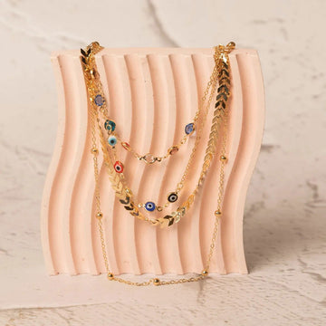 Evil Eye Design with Gold Multi-Layered Necklace