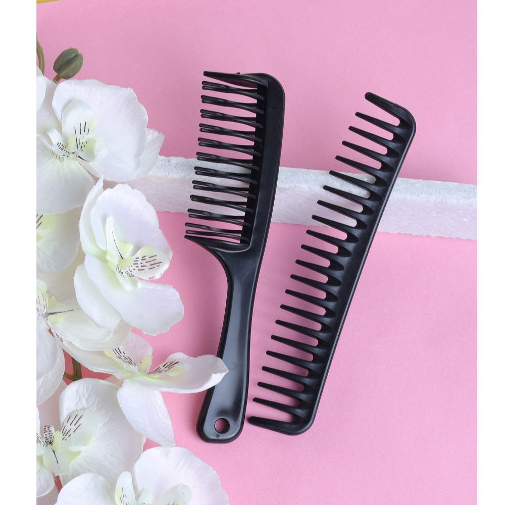 Two black plastic hair combs of different sizes, displayed on a pink background with a white hair accessory on the left side.