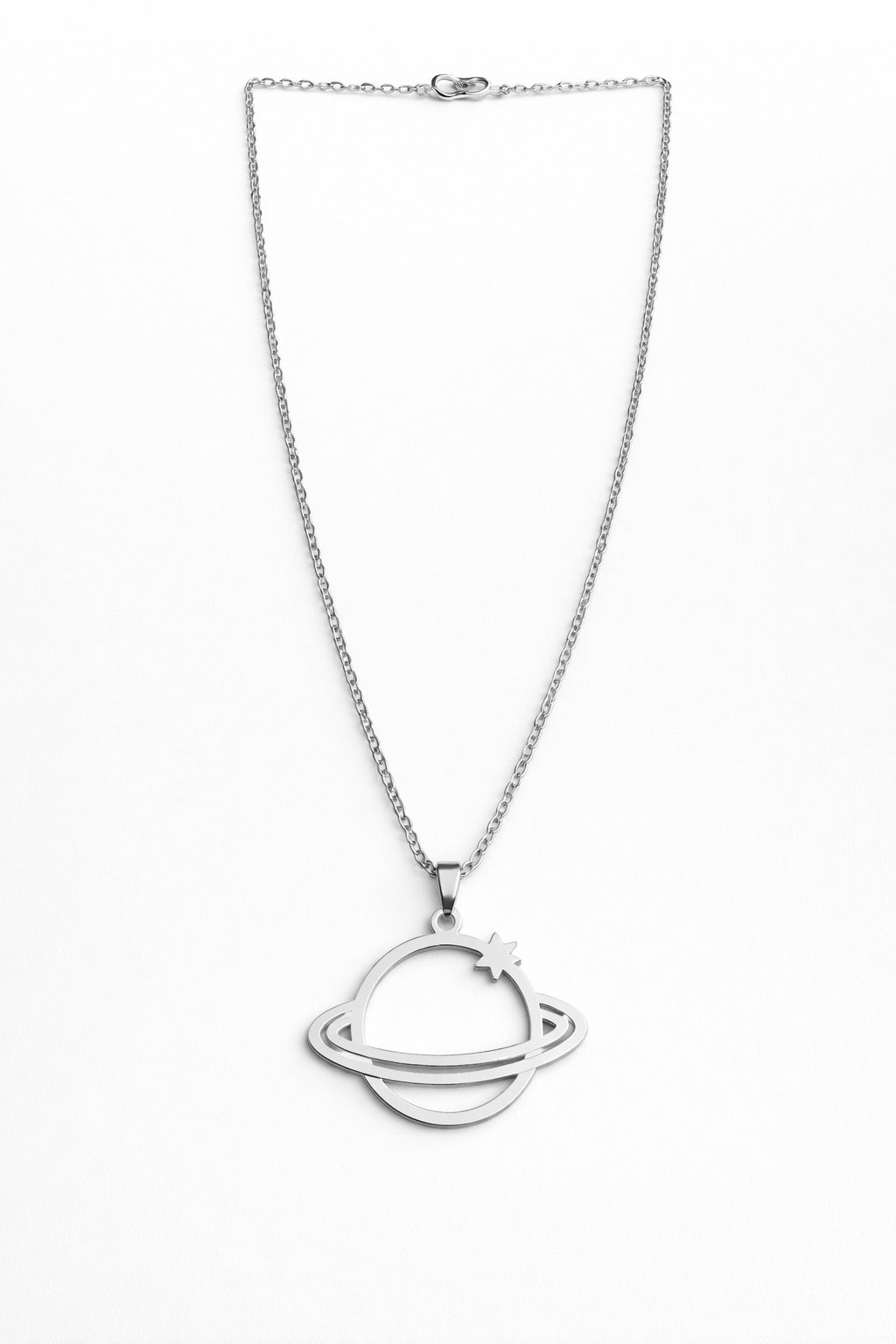 Silver necklace with a planet-shaped pendant on a white background