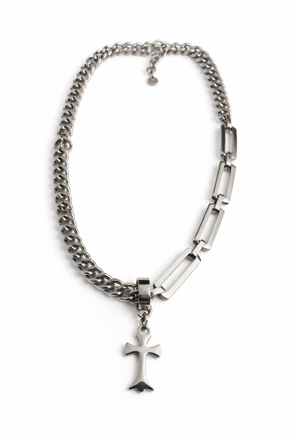 Silver chain necklace with a cross pendant on a white background