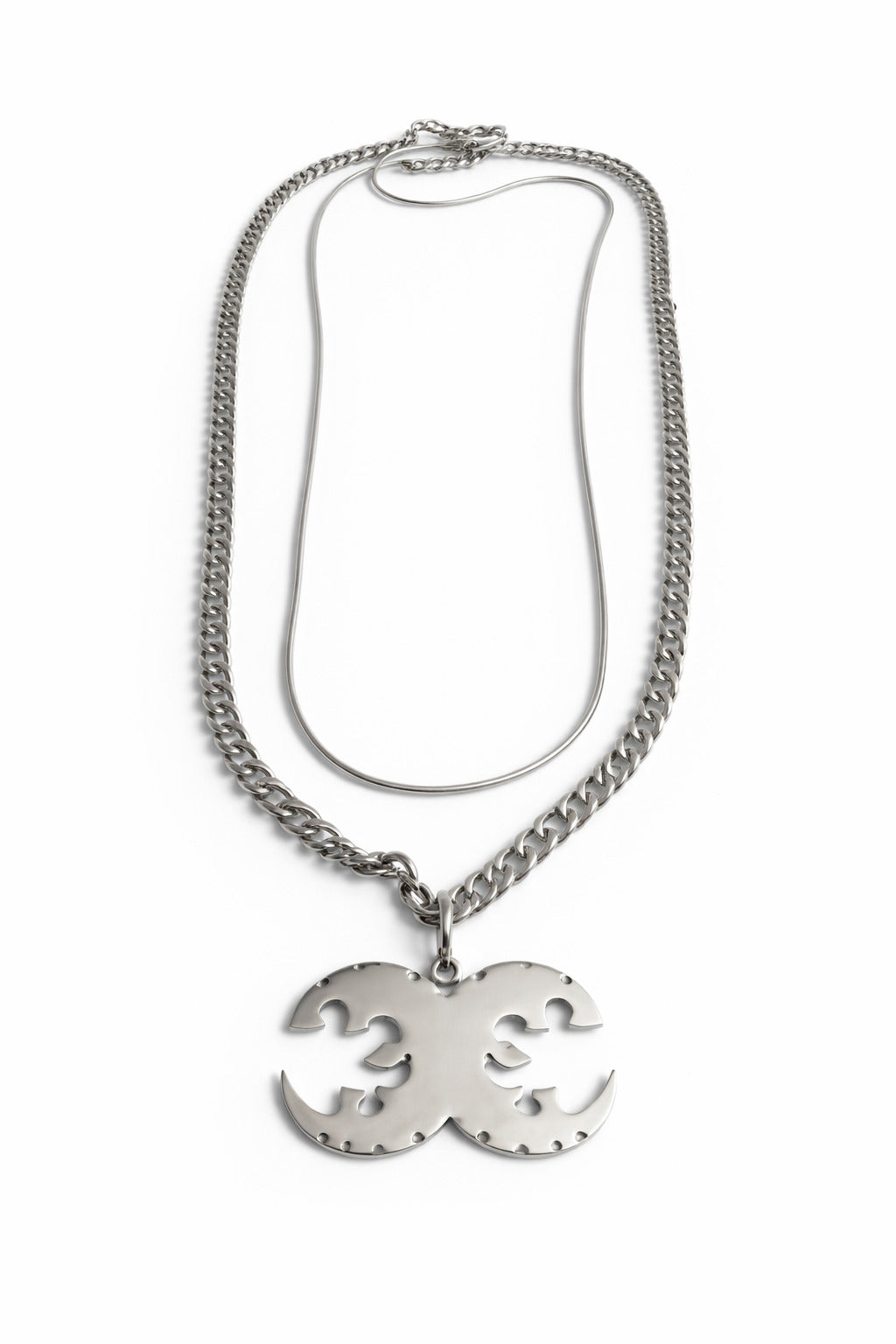 Silver necklace with a pendant on a white background