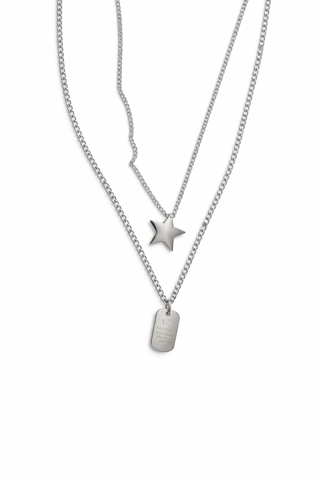 Two silver necklaces with star and dog tag pendants on a white background