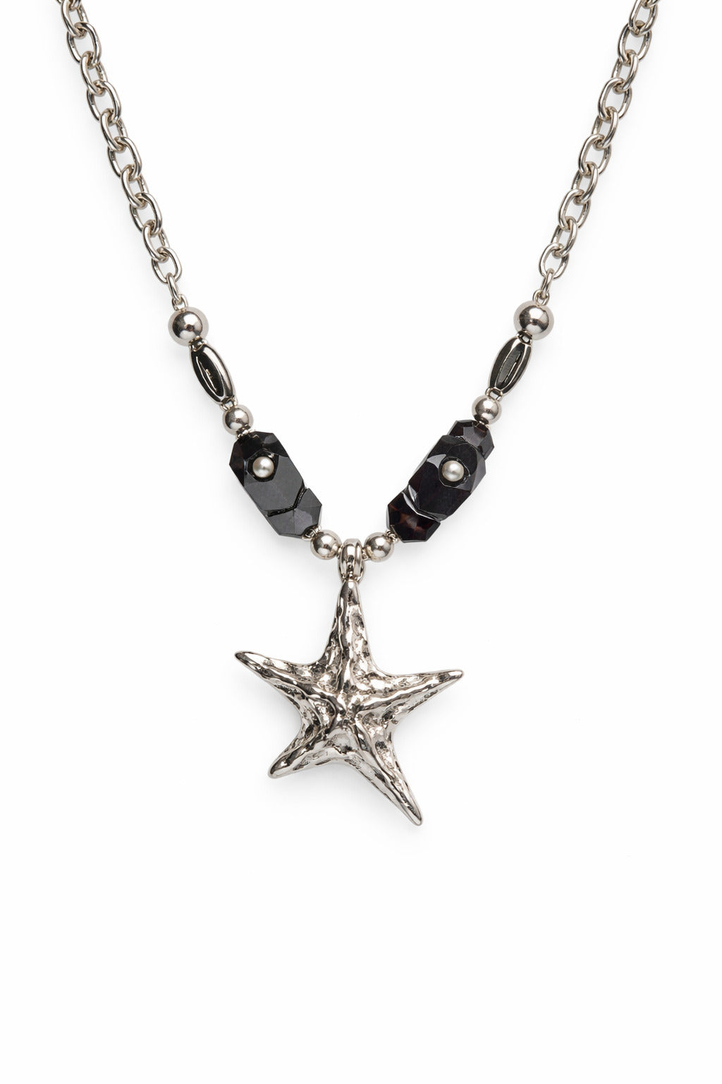 Star-shaped pendant necklace with black beads on a white background