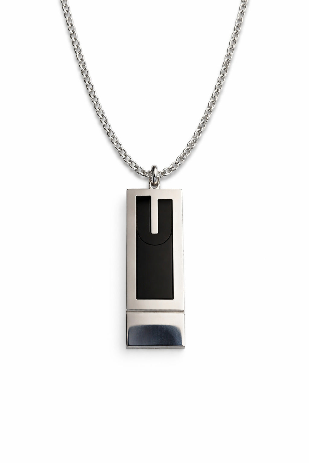Necklace with a rectangular pendant featuring a black square on a white background