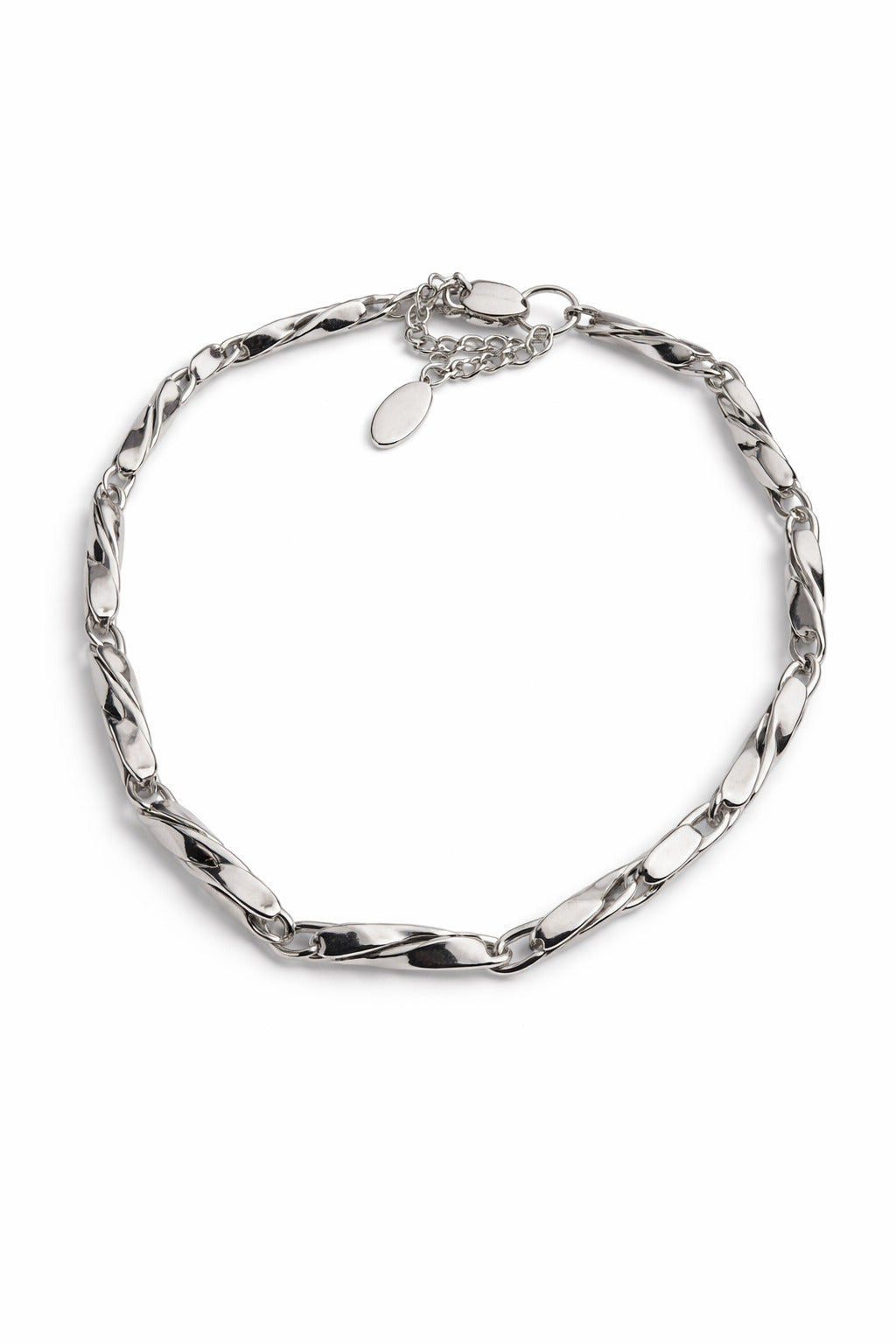 Silver chain necklace on a white background
