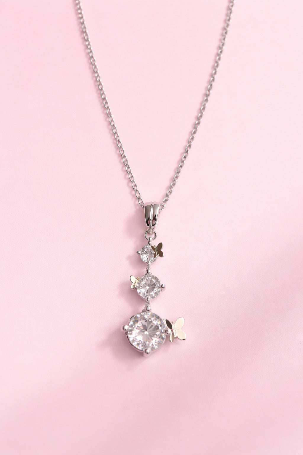 Diamond necklace on a pink background