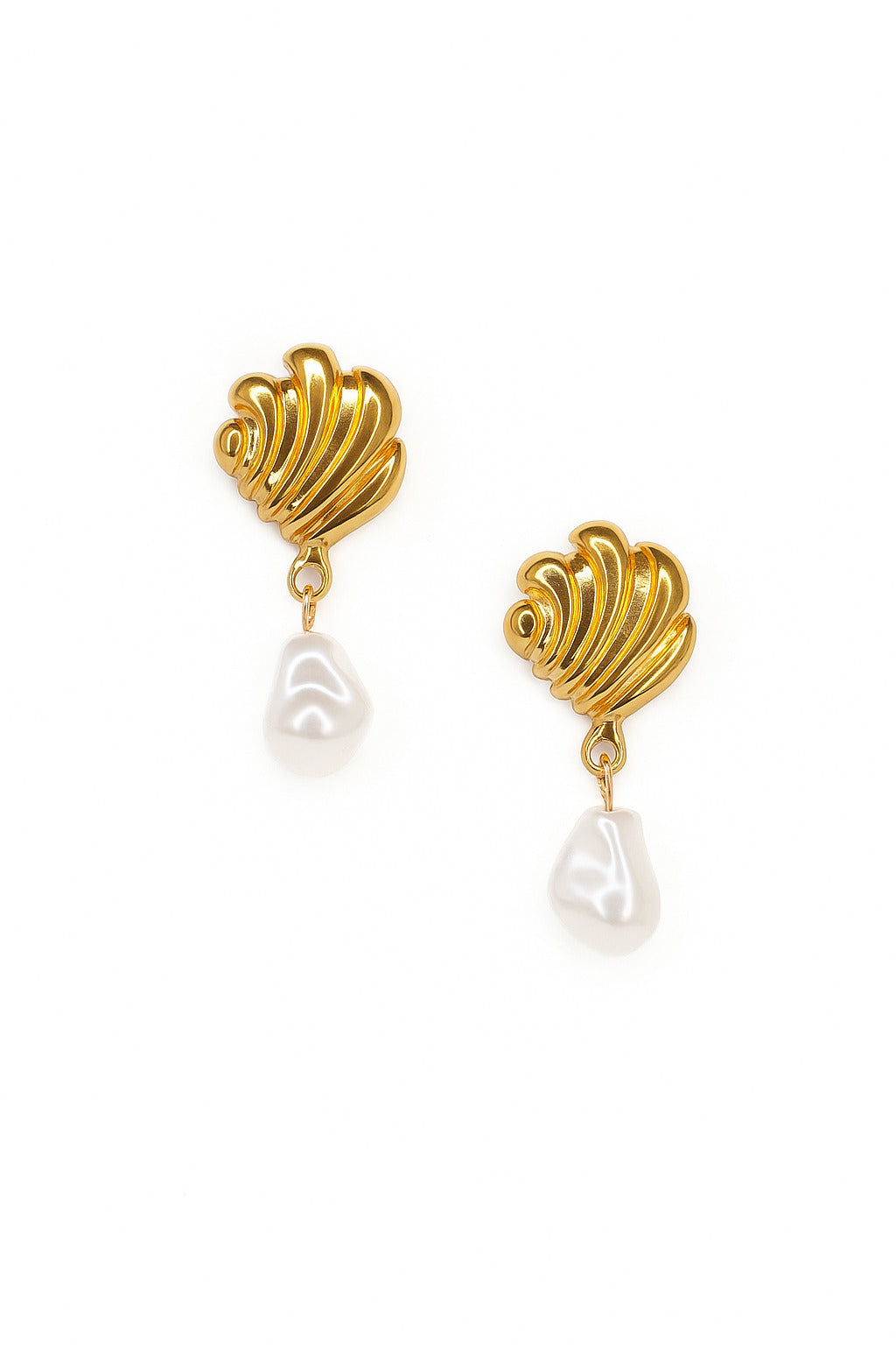 Gold earrings with pearl drops on a white background