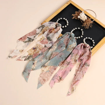 Satin Scrunchies for Girls and Women With A Black Wood Surface