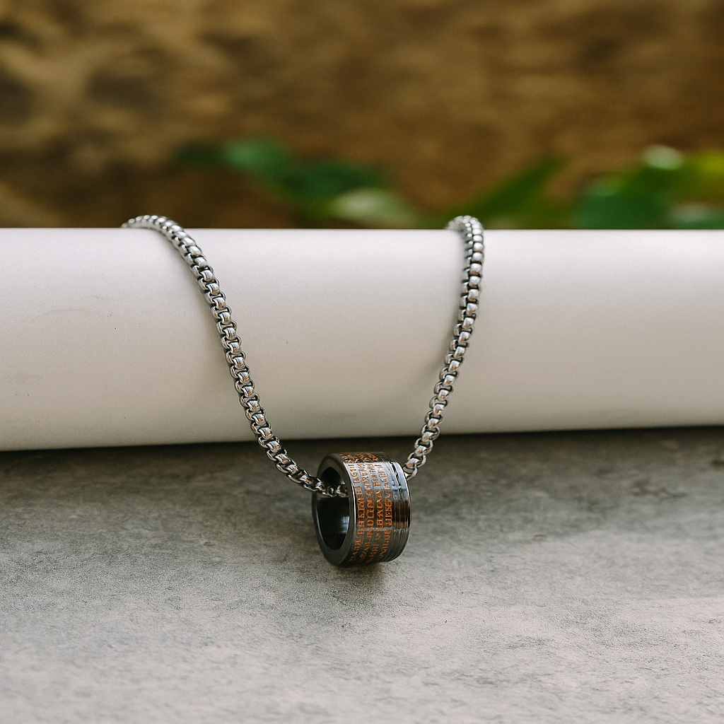 Necklace with a wooden pendant on a stone surface