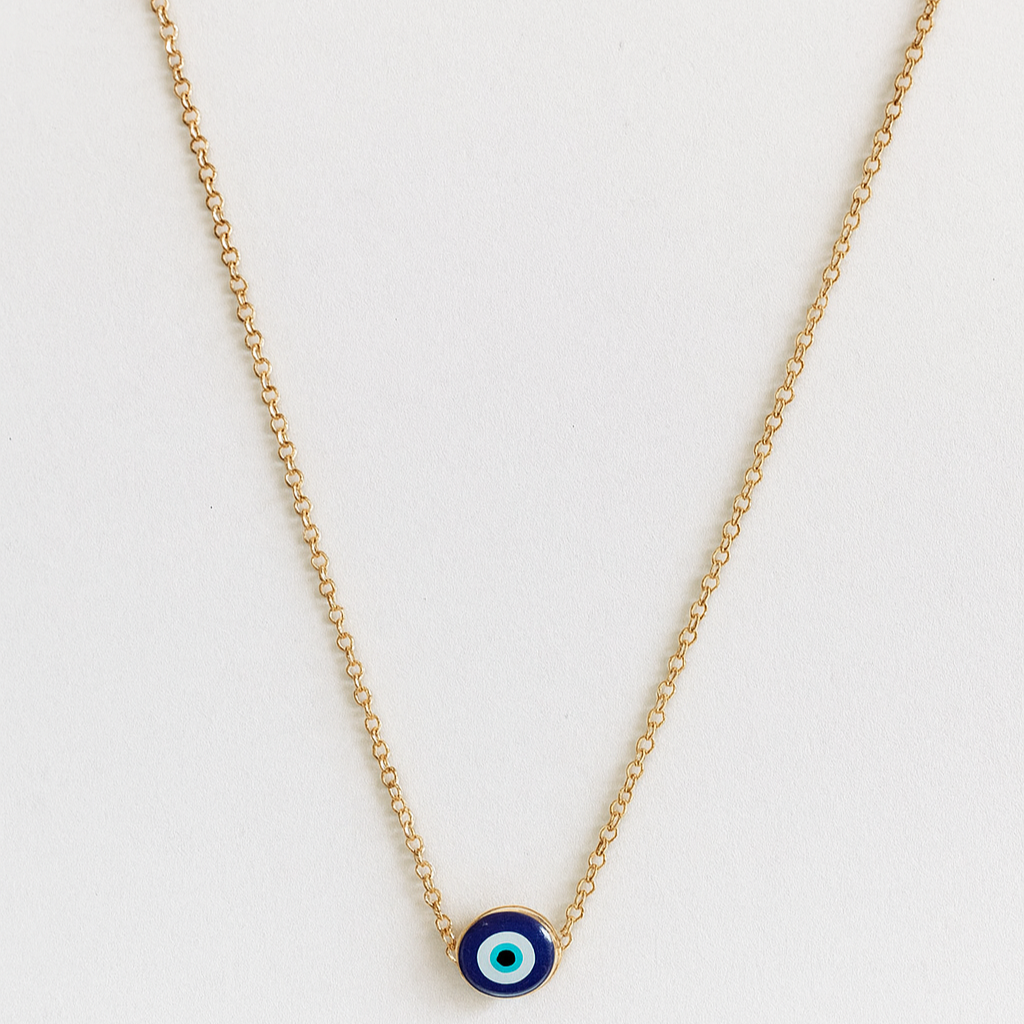 Necklace with a small round pendant on a white background