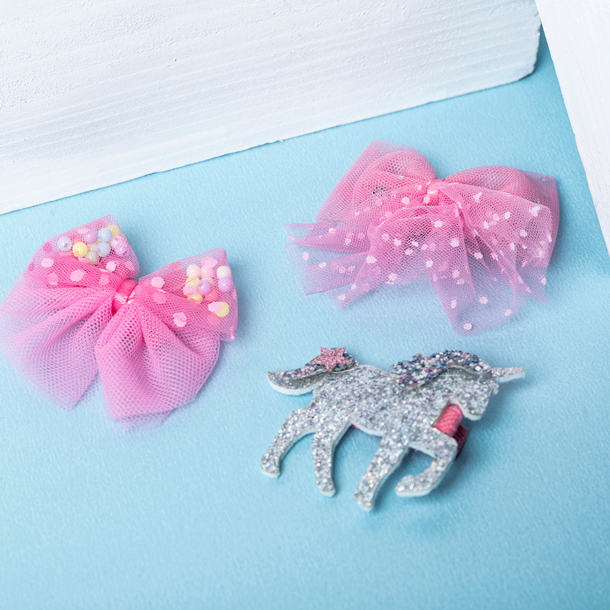 Unicorn Design Hair Clips | Adorable Hair Accessory for Girls With Blue Background
