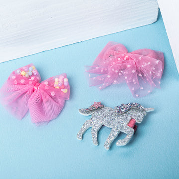 Unicorn Design Hair Clips | Adorable Hair Accessory for Girls With Blue Background

